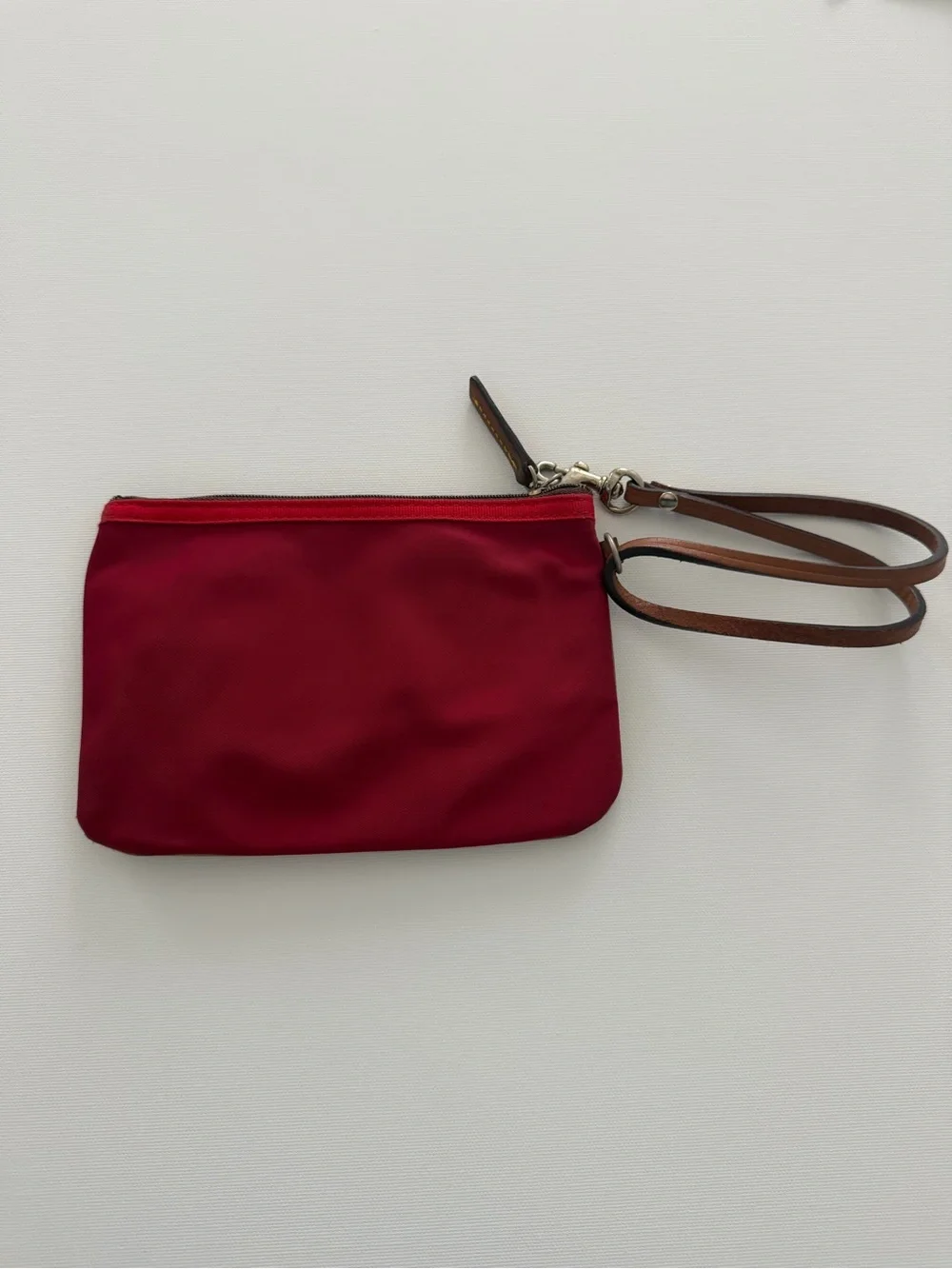 Dooney & Bourke Tan and Red Wristlet with pink interior and Brown Strap